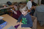 program Kaizenu - hlavolamová hra pro dva ve stylu Tetrisu, náhodný návštěvník Kaizenu